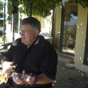 Bruce McDonald singing and playing at Art in the Garden